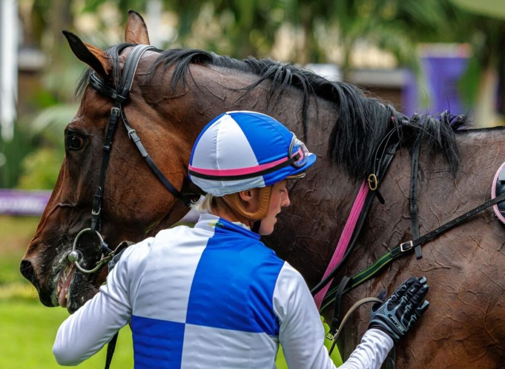 Picture caption: Jockey Rachel Venniker (who will be riding in the main race this Hollywoodbets Durban July weekend) with thoroughbred Lady of distinction Image: Candiese Lenferna